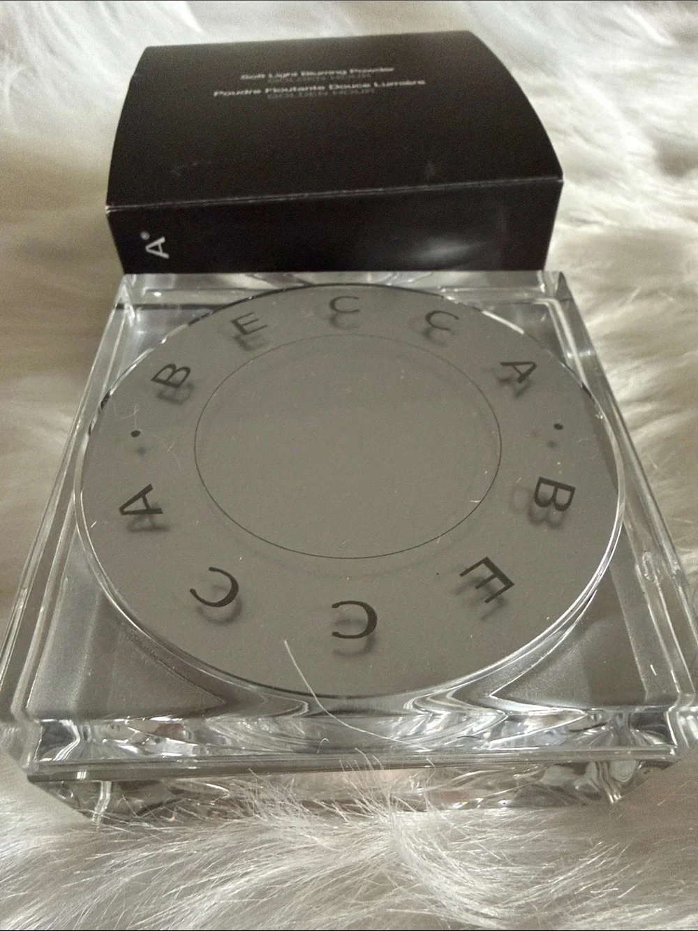 BECCA Soft Light Blurring Powder in Golden Hour - Black Compact Box